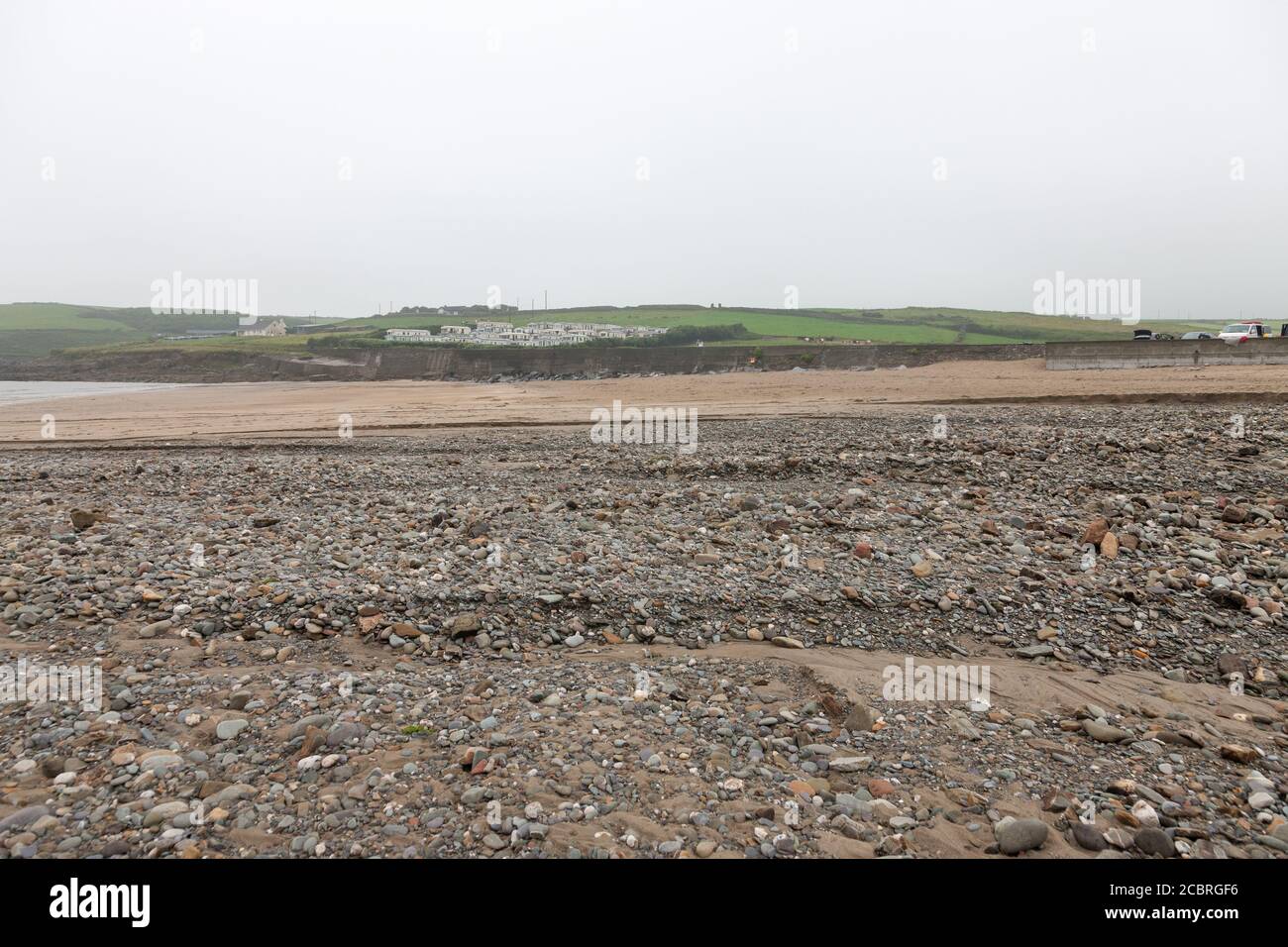 Red Strand, Cork, Ireland. 15th August, 2020. After a night of thunder and lightning with  heavy rain, the beach at Red Strand was washed away -leaving only rock in West Cork, Ireland. - Credit; David Creedon / Alamy Live News Stock Photo