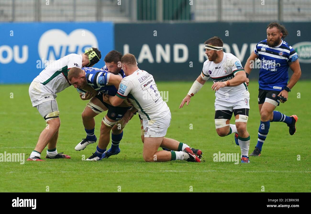 Bath's Sam Underhill (second left) tackled by London Irish's Harry Elrington during the Gallagher Premiership match at The Recreation Ground, Bath. Stock Photo