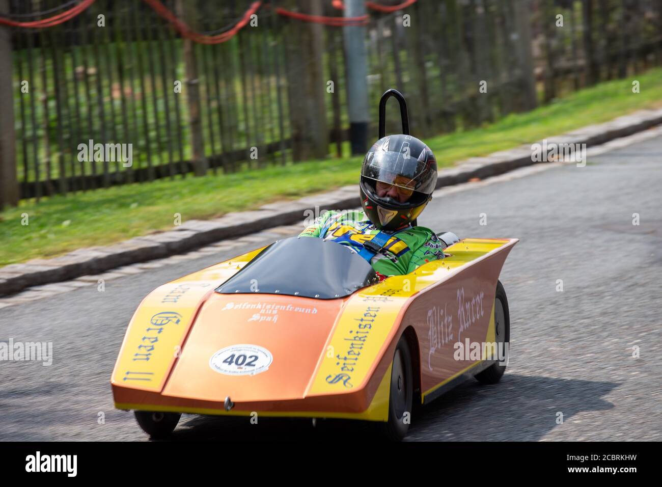 Freital, Germany. 15th Aug, 2020. 11th German Soapbox Racing Championships  in Freital, Saxony. Hansi Wittkowski, soapbox name: Blitz-Racer,  Großräschen (Brandenburg), Germany. A good 80 drivers take part in the race  in the