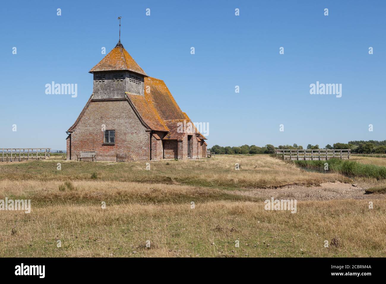 St Thomas à Becket Church in Fairfield, Kent, on a sunny day. Stock Photo