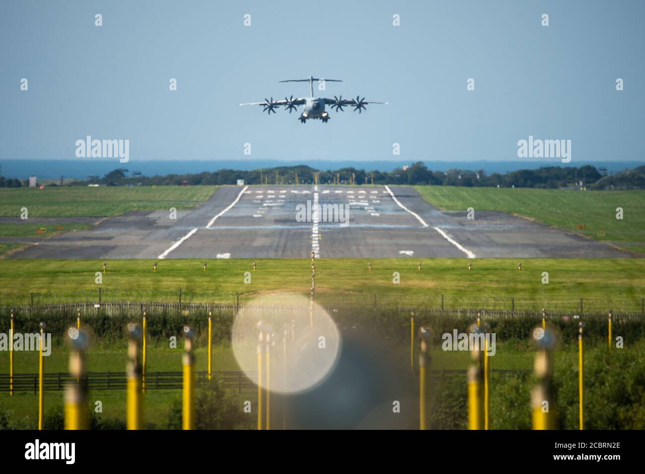 Prestwick, Scotland, UK. 15th Aug, 2020. Pictured: On the 75th Anniversary of VJ Day (Victory in Japan Day) celebrating the end of the Second World War a Royal Airforce (RAF) Airbus A400B from RAF Brize Norton is seen on a training sortie at Prestwick Airport and the surrounding area carrying out various manoeuvres from touch and gos to flying in patterns and making steep descents onto finals for landing. Credit: Colin Fisher/Alamy Live News Stock Photo