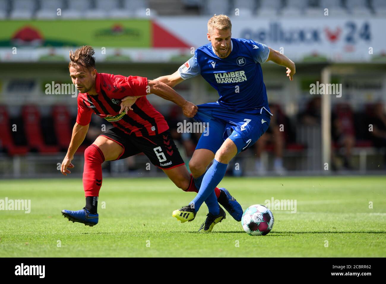 Marc Lorenz (KSC) in a duels with Amir Abrashi (Freiburg). GES/Football/2. Bundesliga: Test match: SC Freiburg - Karlsruher SC, August 15, 2020 Football/Soccer: 2. Bundesliga: Test match SC Freiburg vs KSC, Freiburg, August 15, 2020 | usage worldwide Stock Photo