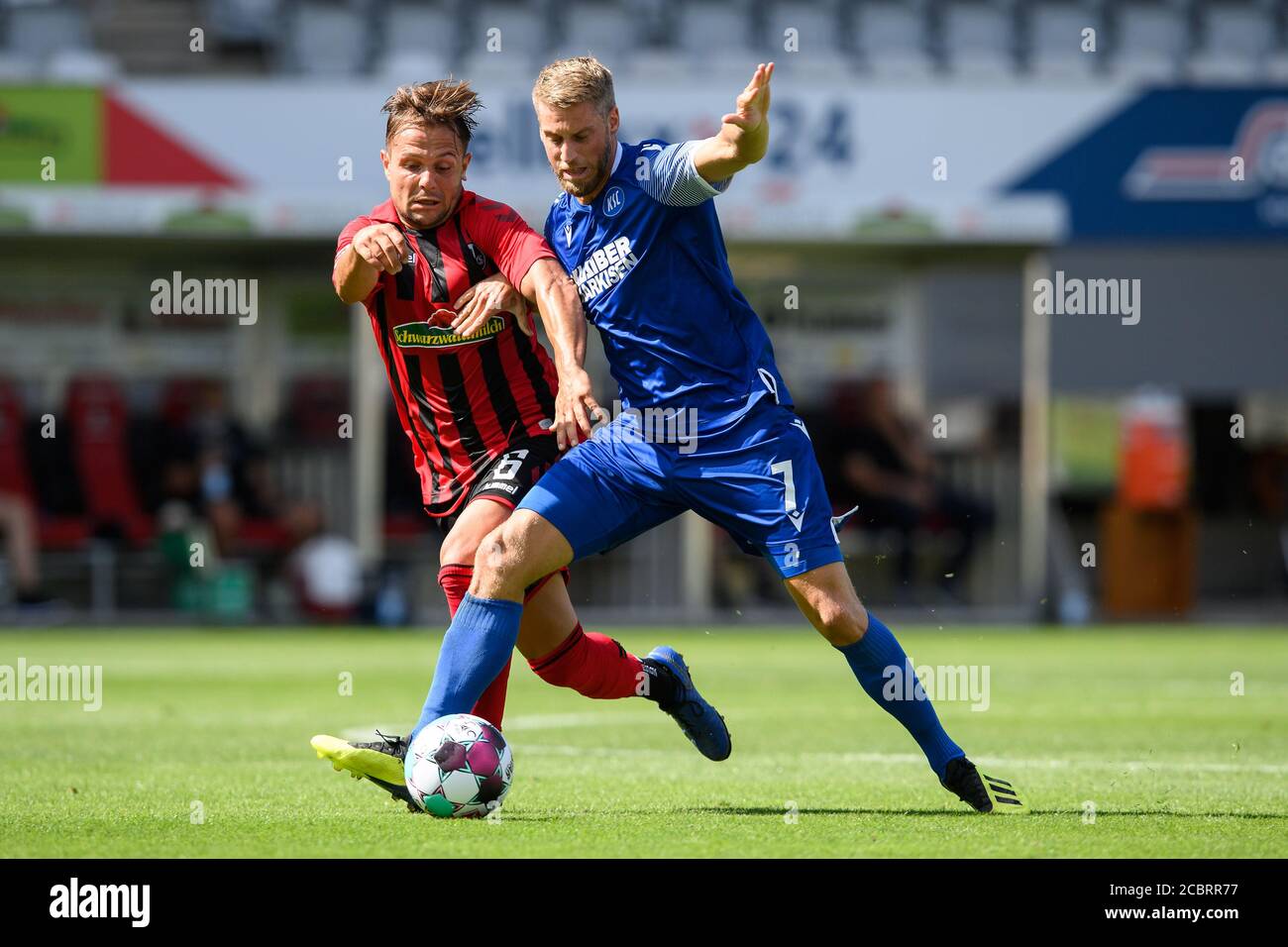 Marc Lorenz (KSC) in a duels with Amir Abrashi (Freiburg). GES/Football/2. Bundesliga: Test match: SC Freiburg - Karlsruher SC, August 15, 2020 Football/Soccer: 2. Bundesliga: Test match SC Freiburg vs KSC, Freiburg, August 15, 2020 | usage worldwide Stock Photo