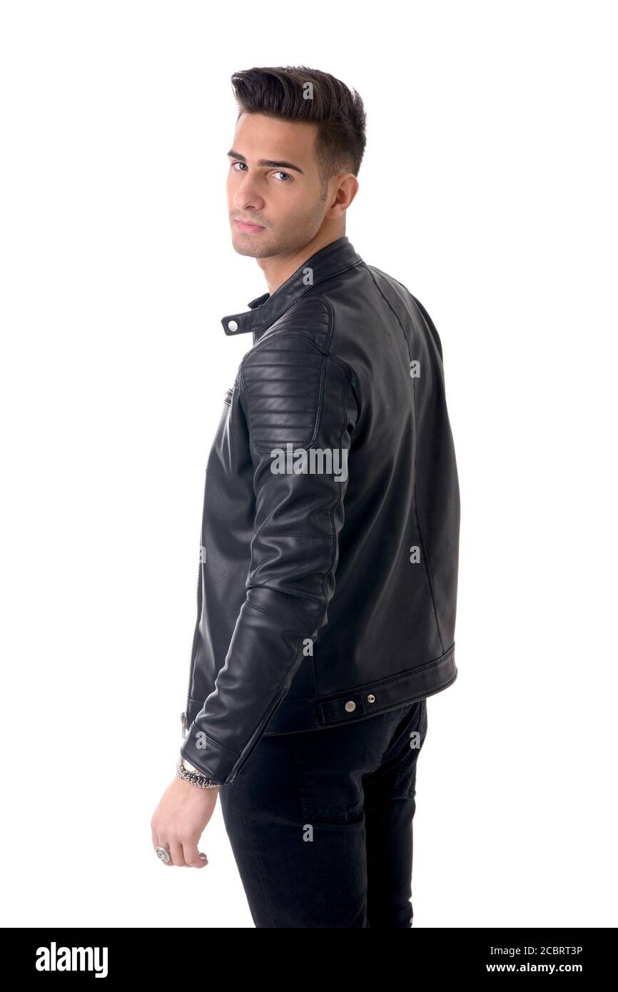 Young handsome man standing in studio shot Stock Photo