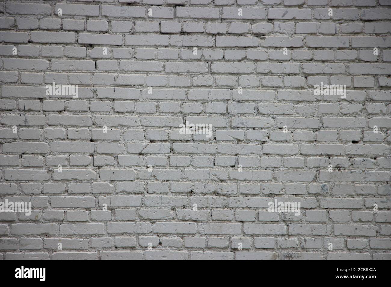 Light grey grunge brick wall background texture Stock Photo - Alamy