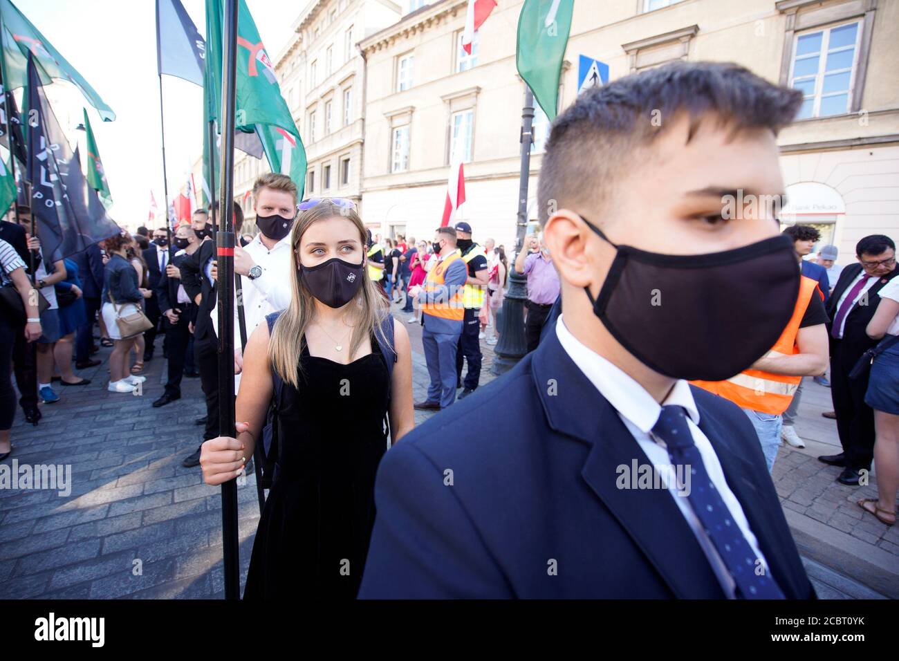 Warsaw, Pl. 15th Aug, 2020. Several hundred people are seen taking part in a march of the ultranaionatlist All Polish Youth (Mlodziez Wszechpolska) in Warsaw, Poland on August 15, 2020. The far-right and ultranationalist youth organisation organized a march on Saturday in light of the 100th anniversary of the Battle of Warsaw, the battle that turned the tide on the Bolshevik invasion of Europe. The All Polish Youth also oppose liberal values and oppose non-binary gender people who they see as a threat to Polish culture. (Photo by Jaap Arriens/Sipa USA) Credit: Sipa USA/Alamy Live News Stock Photo