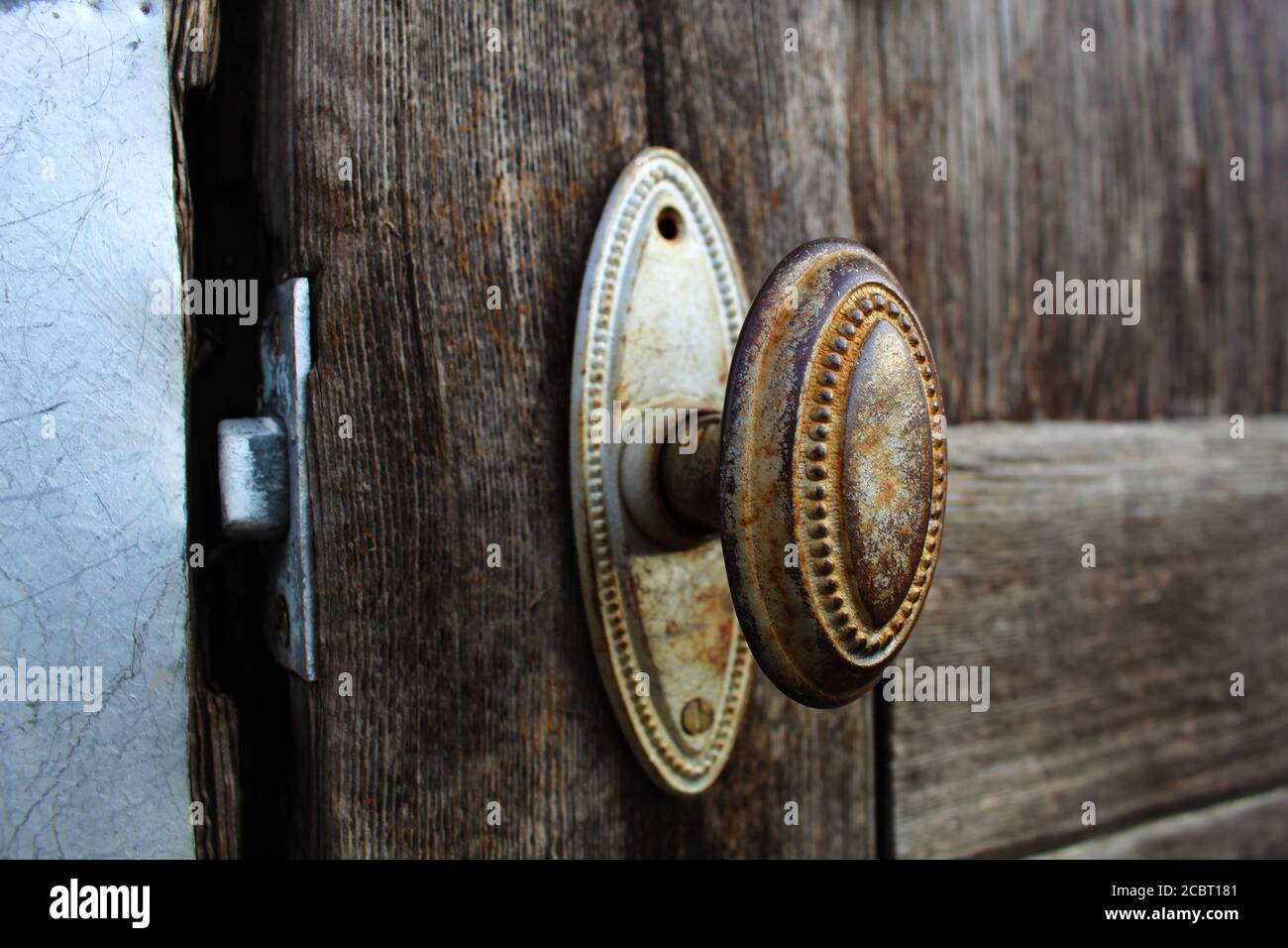 Old Rustic Door Knob on a House in Oklahoma Partially Open Stock Photo