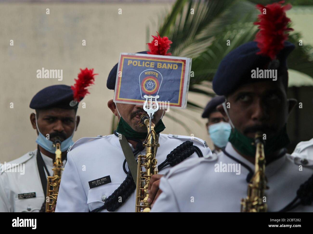 Mumbai, India. 15th Aug, 2020. Policemen music band wearing face masks playing during the celebration.India celebrated its 74th Independence Day. It is annually celebrated on 15th August as a national holiday commemorating the nation's independence from the United Kingdom on 15 August 1947. Credit: SOPA Images Limited/Alamy Live News Stock Photo