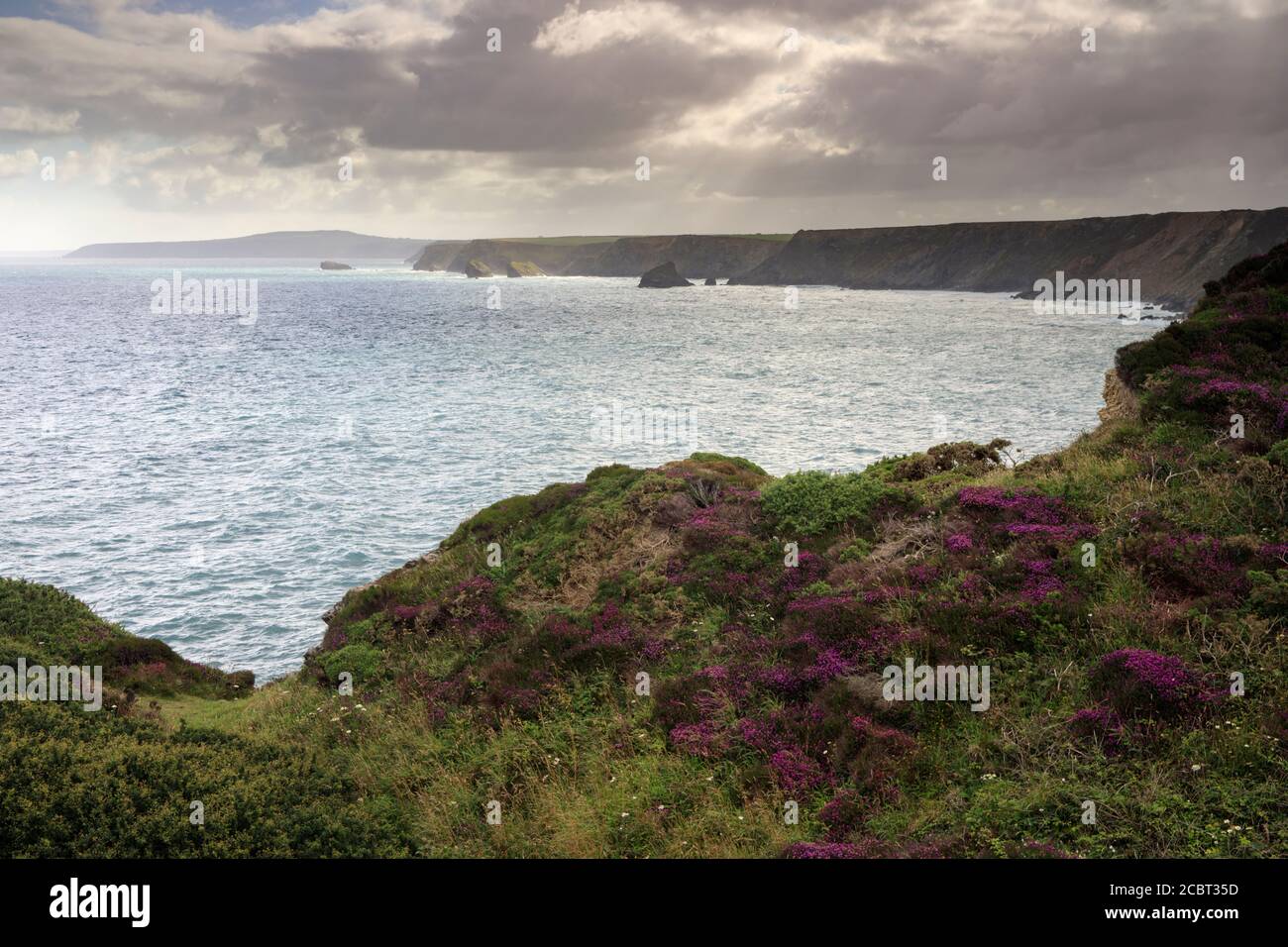 The view along the north coast of Cornwall captured from the South West Coast Path to the east of Hell's Mouth. Stock Photo