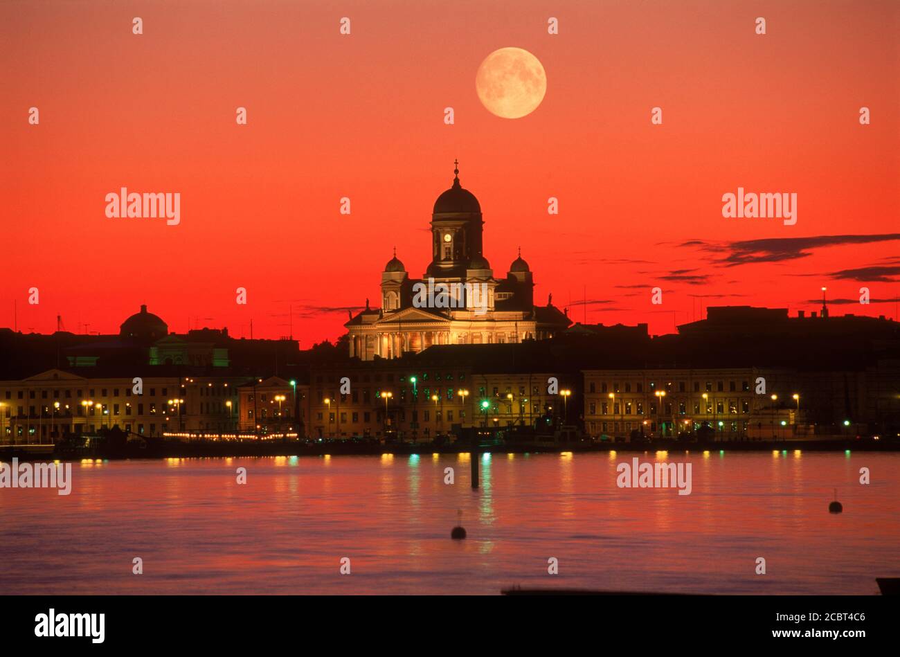 Senate Square Cathedral over South Harbor with yachts under full moon Helsinki Finland Stock Photo
