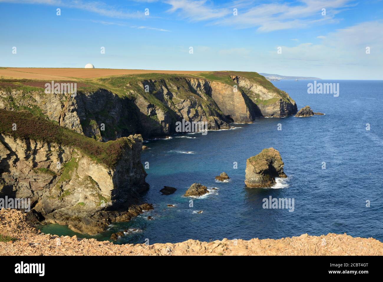 A view of Gullyn Rock on the coast path between Porthtowan and Portreath in Cornwall. Stock Photo