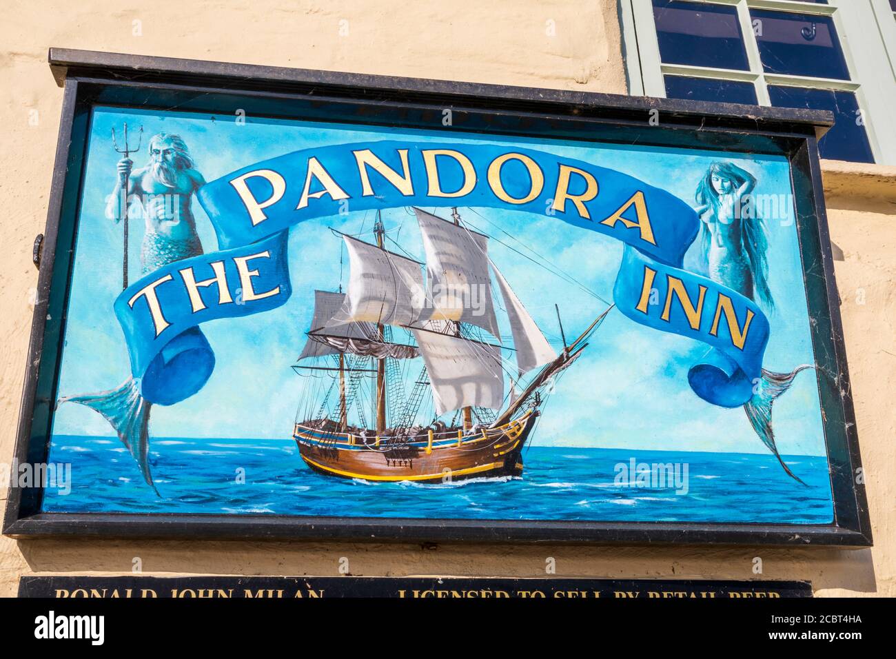 A sign over the main doorway into The Pandora Inn on Restronguet Creek near Mylor in Cornwall. Stock Photo