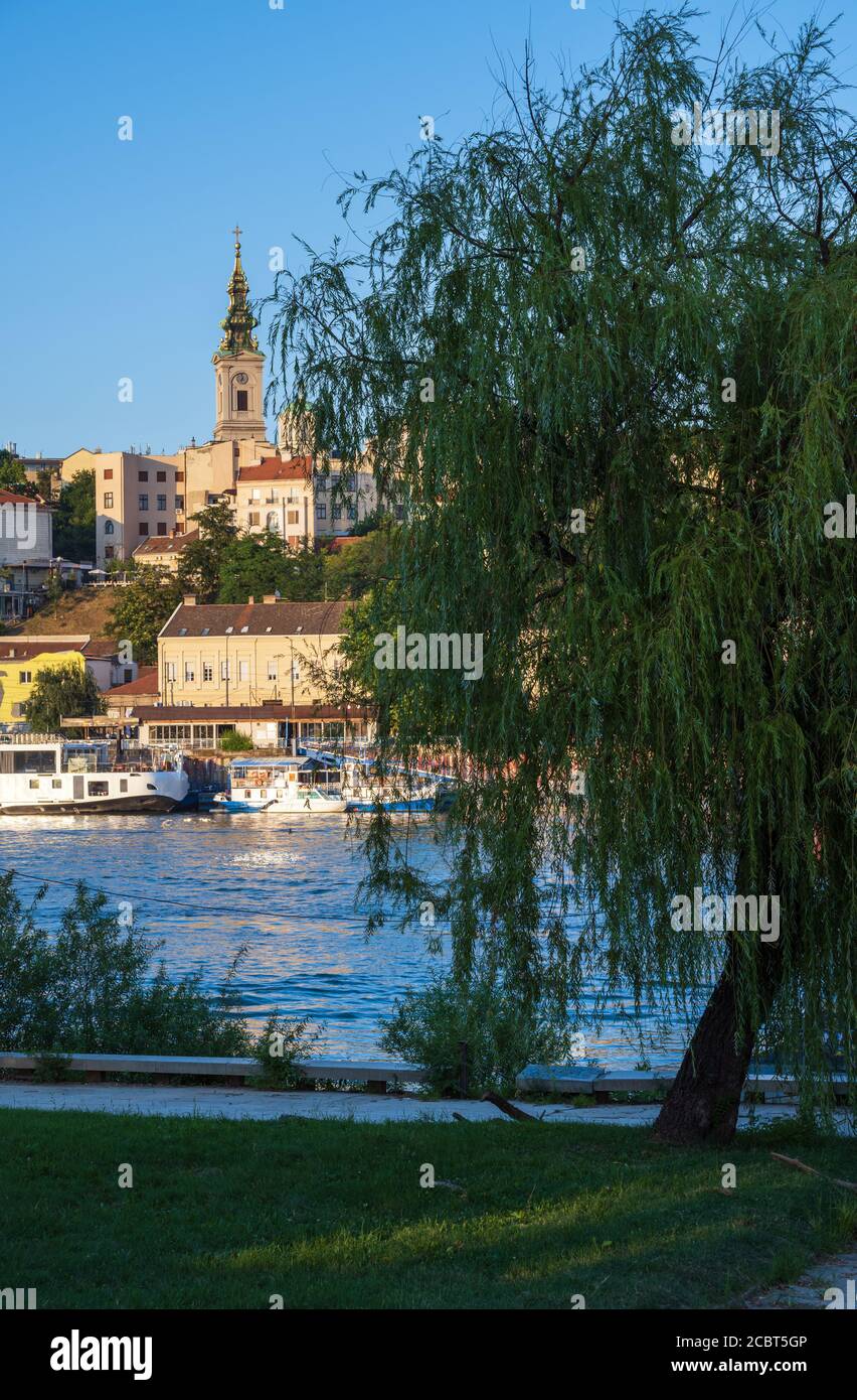Beautiful summer view of the historic center of Belgrade from the bank of the Sava River near Branko's bridge (Brankov most), Serbia. People and signs Stock Photo