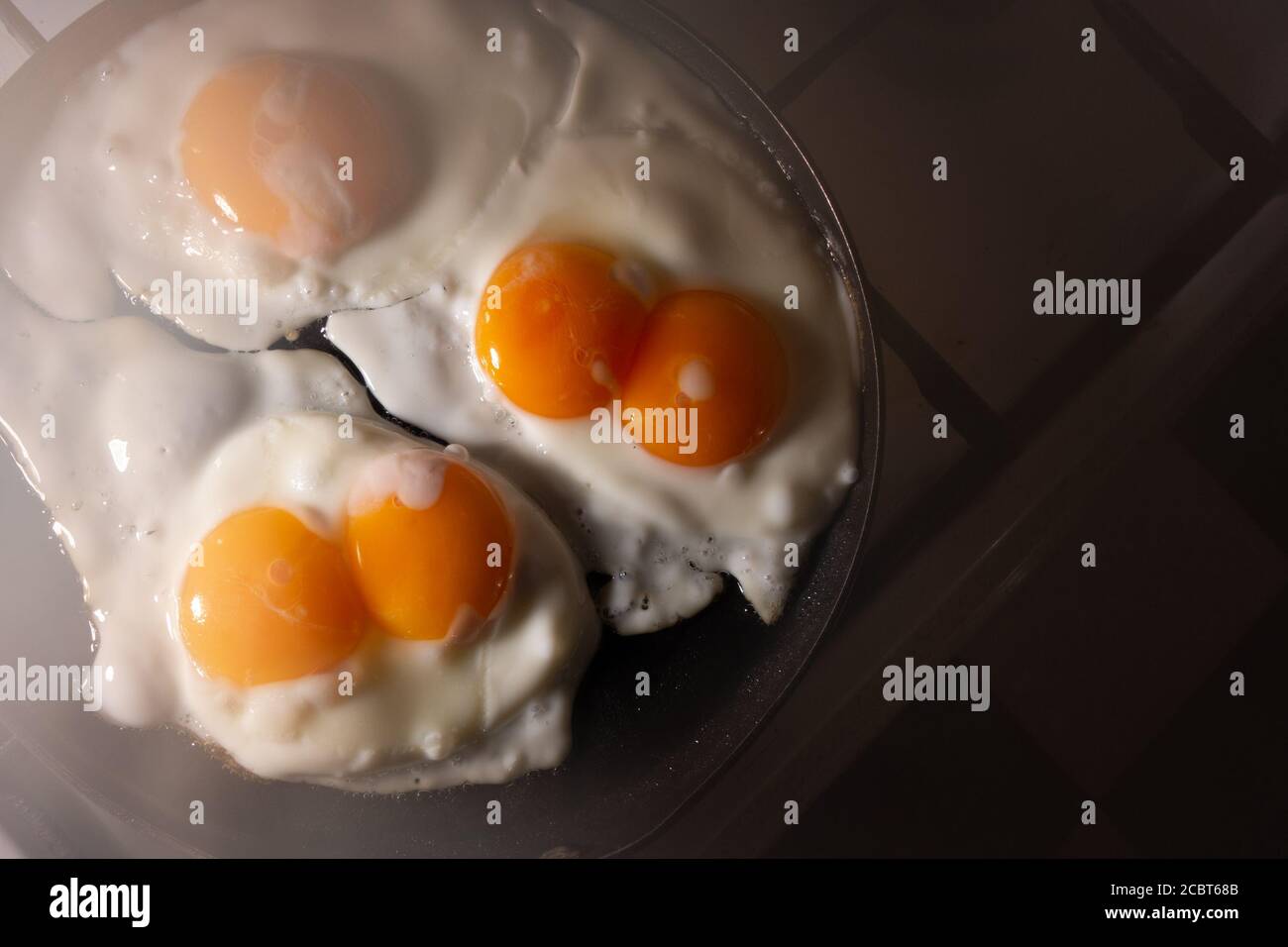 Two Fried Eggs Stock Photo, Picture and Royalty Free Image. Image 17696336.