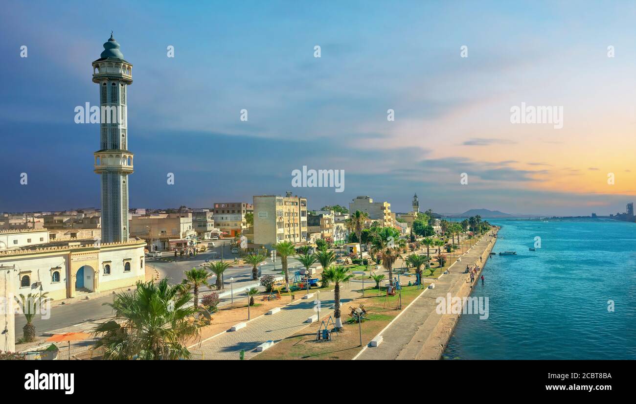 Panoramic view  of embankment  and tall minaret in old city Bizerte. Tunisia, North Africa Stock Photo