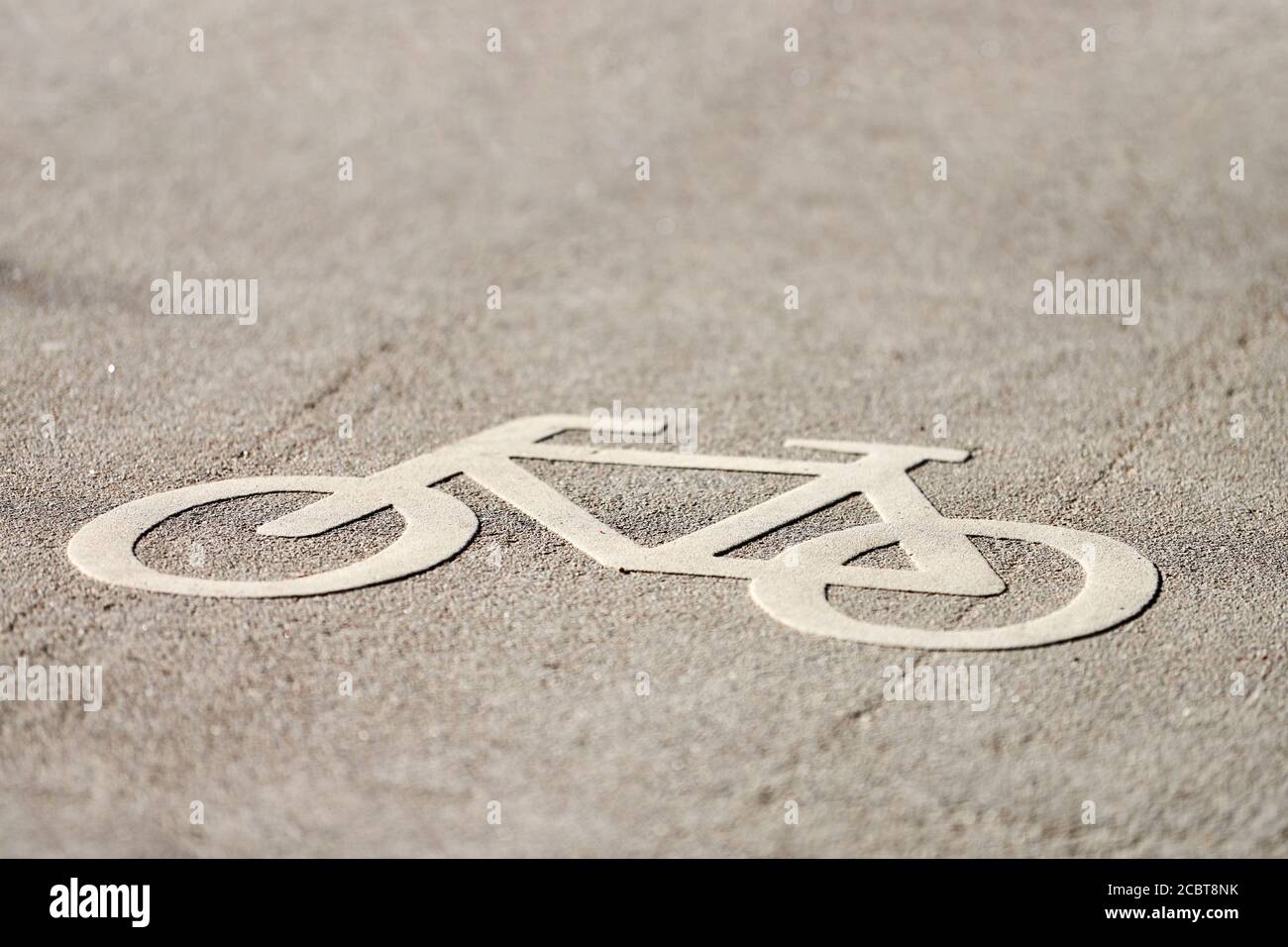 Bicycle sign on road. Bike lane sign only bikes allowed. Road marking
