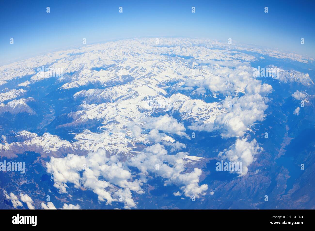 Plane flying around globe hi-res stock photography and images - Alamy