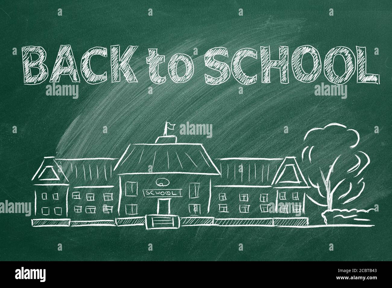 Hand drawing Back to School concept on green chalkboard. Stock Photo