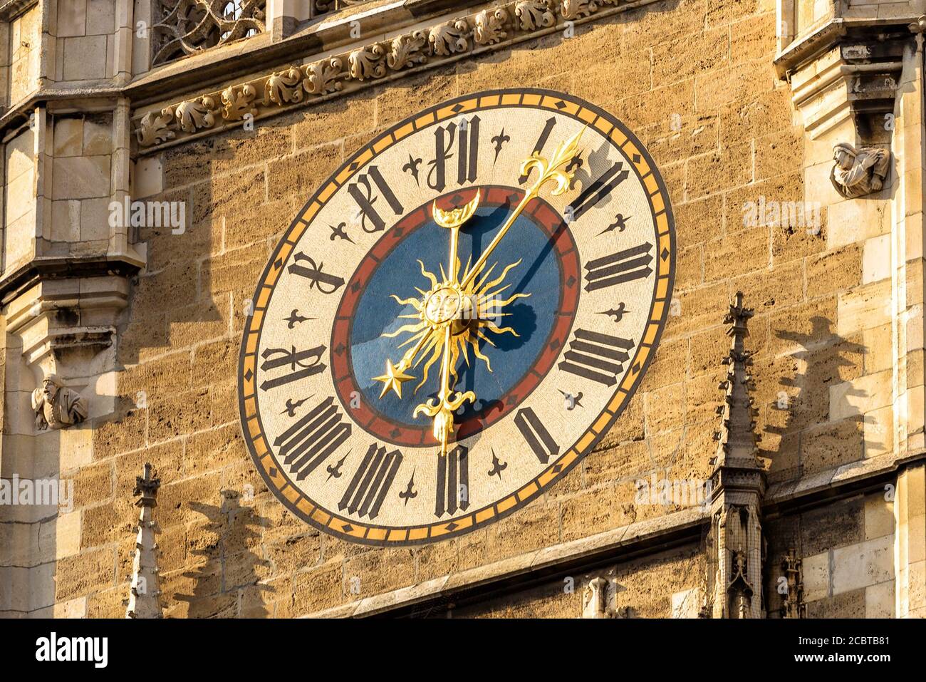 Clock Tower of New Town Hall (Rathaus) close-up, Munich, Bavaria, Germany. It is old landmark of Munich located on Marienplatz square. Detail of Gothi Stock Photo