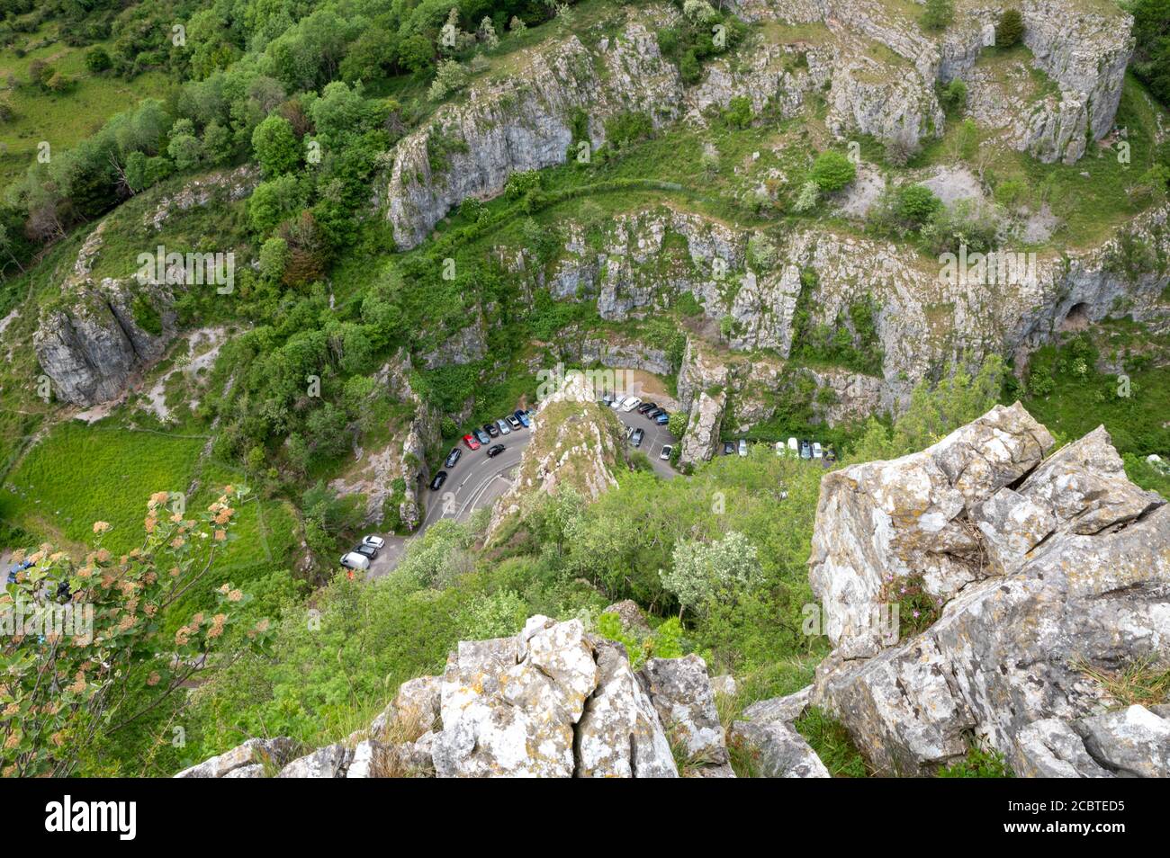 Cliffs of Cheddar Gorge from high viewpoint. High limestone cliffs in canyon in Mendip Hills in Somerset, England, UK Stock Photo