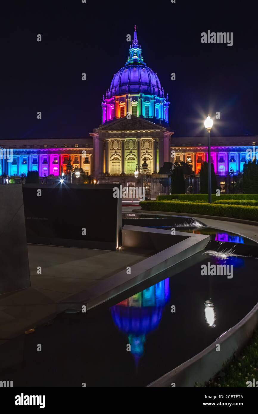 San Francisco City Hall lights up rainbow colors to celebrate the LGBT pride month in June, California, United States. Stock Photo