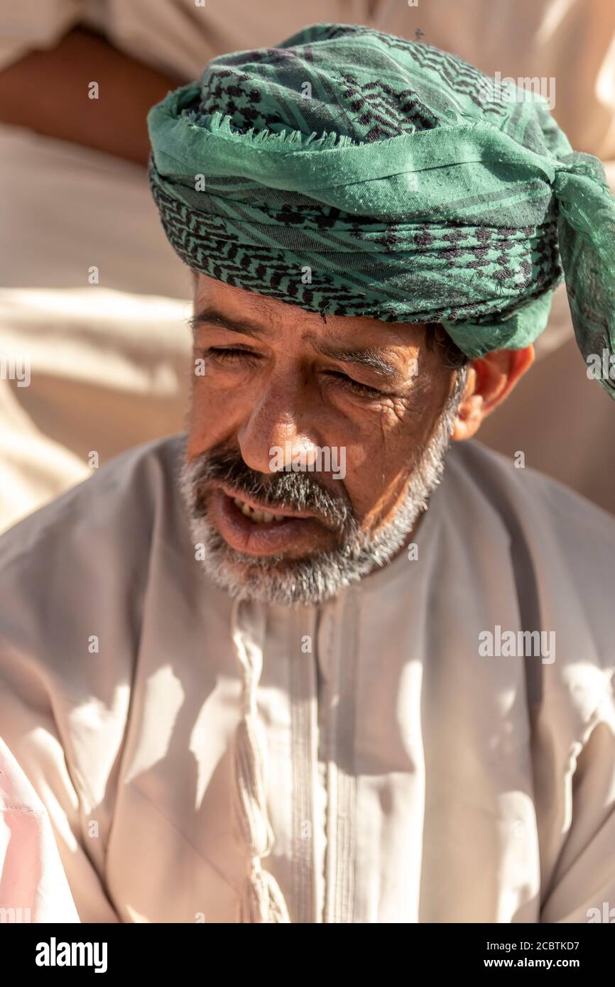 portrait of omani merchant attending the goat auction Stock Photo