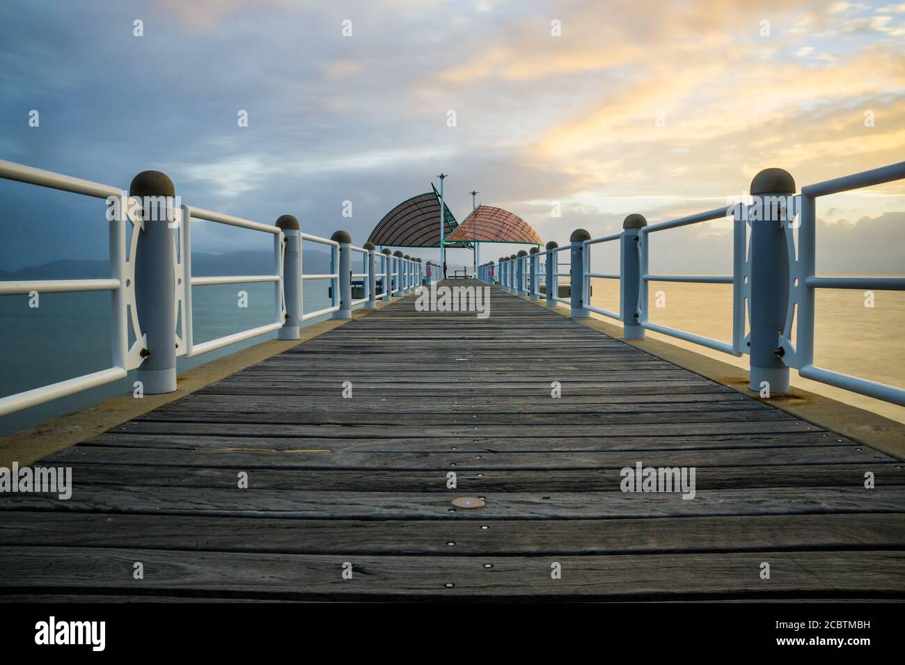 Early morning with sunrise on the Strand jetty or pier in Townsville, North Queensland Stock Photo