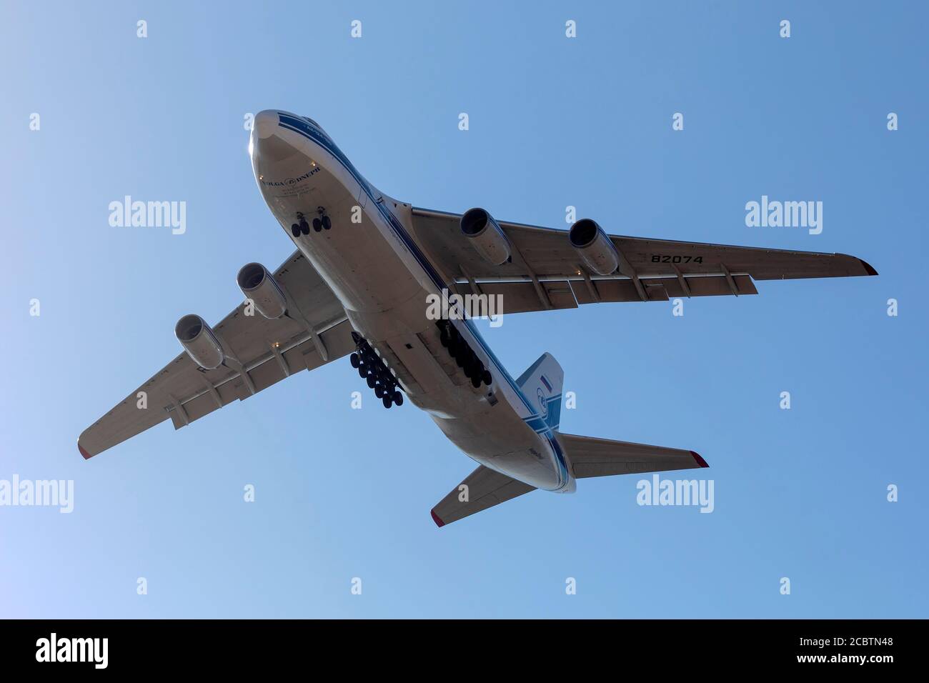 Volga-Dnepr Airlines Antonov An-124-100 Ruslan (REG: RA-82074) on long finals runway 31. Stock Photo