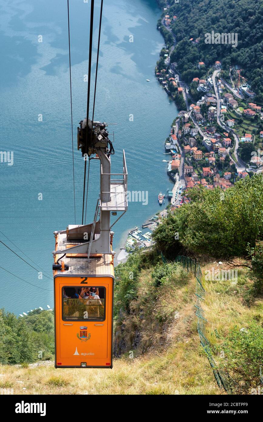 Cable car running from Argegno to Pigra with the Como lake in background. Stock Photo