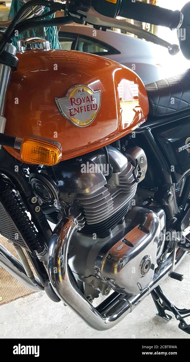 Bordeaux , Aquitaine / France - 08 10 2020 : Royal Enfield logo sign on orange Indian motorbike steel tank of vintage re motorcycle Stock Photo