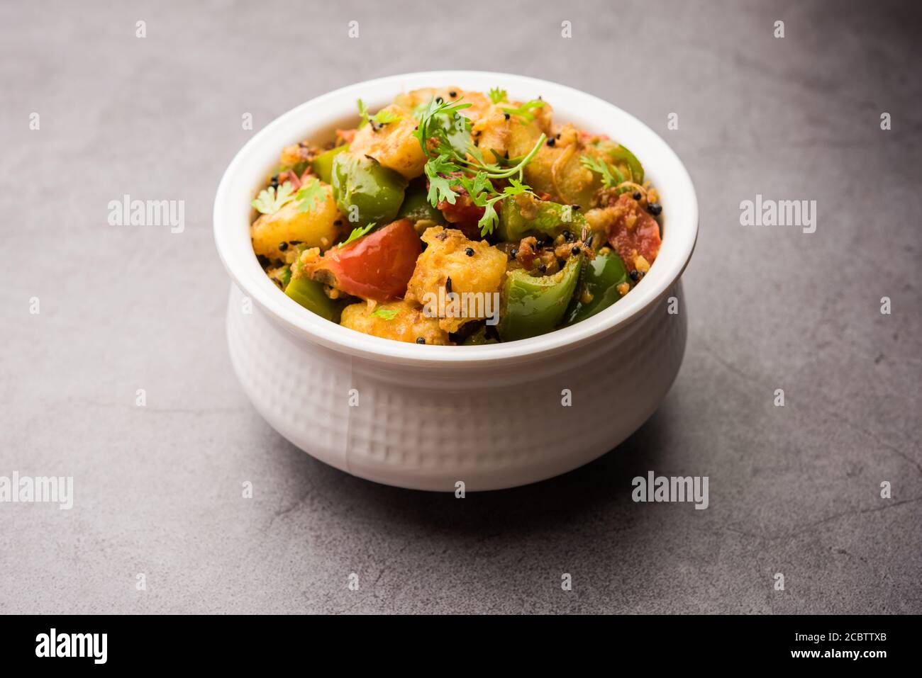 Aloo capsicum sabzi or potato and bell pepper sabji is an Indian