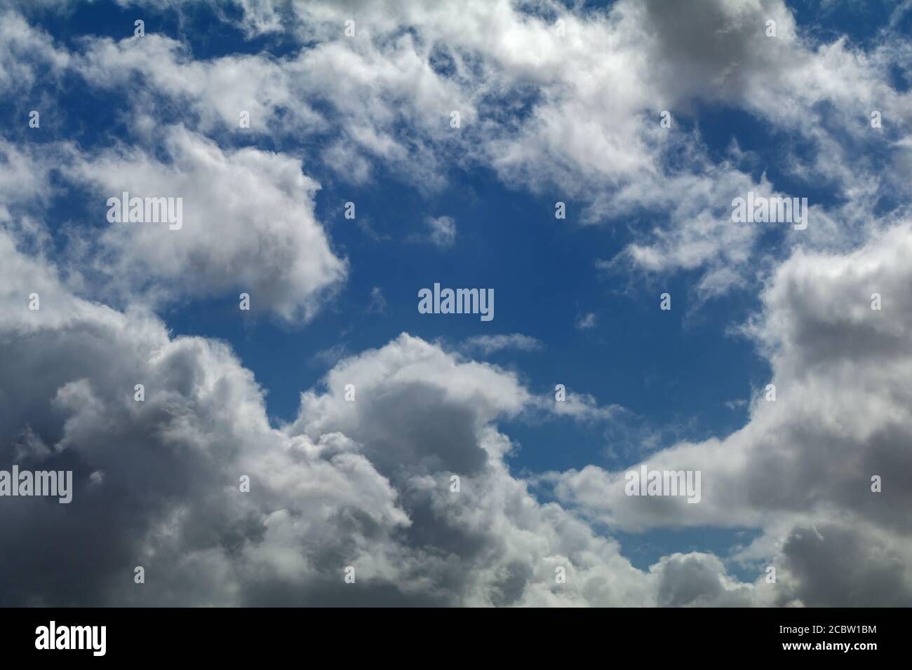 Fluffy white clouds against serene hi-res stock photography and images ...