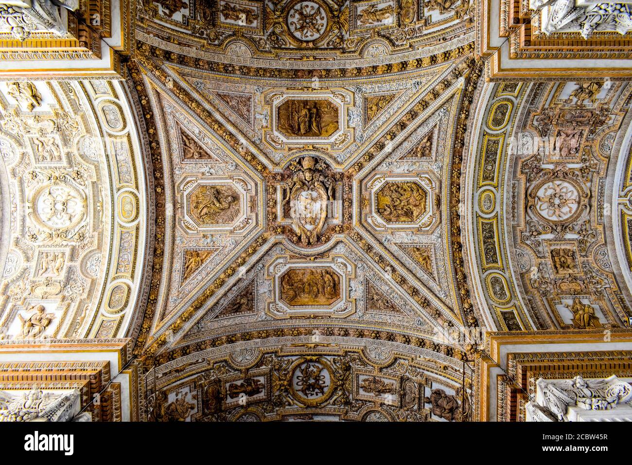 The intricate ceiling at Saint Peter's Basilica Stock Photo