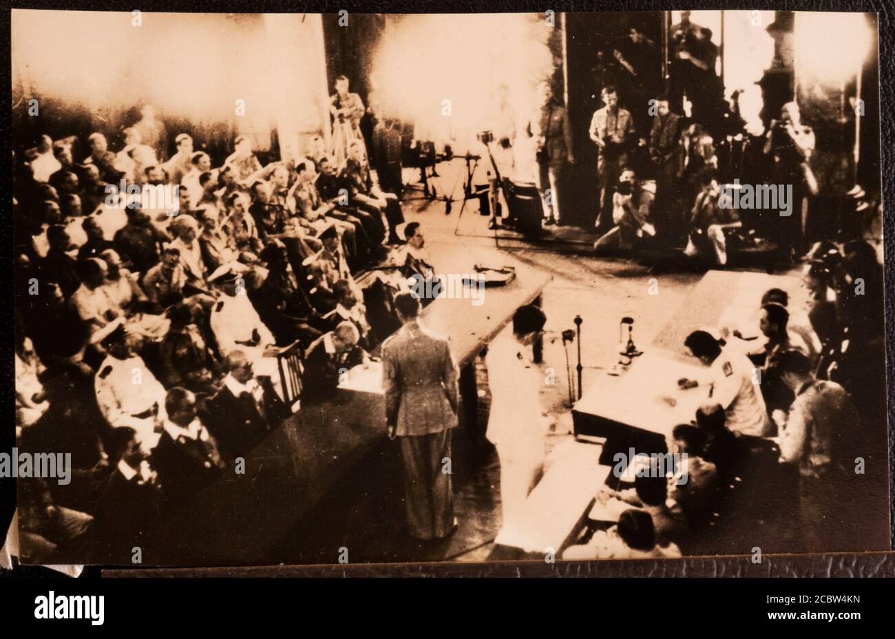 Japanese Surrender to Lord Louis Mountbatten in Singapore 12 September 1945 These original photographic prints were bought home from the far east by the photographers father in the bottom of a tool box after the war. They are in a family album and copied by this photographer SINGAPORE. 1945-09-12. ADMIRAL LORD LOUIS MOUNTBATTEN SUPREME ALLIED COMMANDER, SOUTH EAST ASIA COMMAND (SEAC), ACCEPTED THE SURRENDER OF JAPANESE FORCES IN THE AREA DURING A SURRENDER CEREMONY HELD IN THE COUNCIL CHAMBER, MUNICIPAL BUILDING, SINGAPORE. IN THE ABSENCE OF FIELD MARSHAL COUNT TERAUCHI, JAPANESE COMMANDER IN Stock Photo