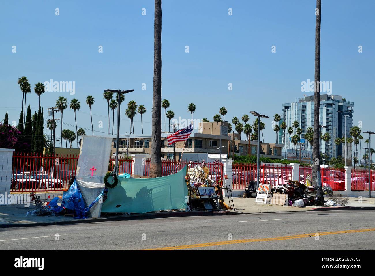 Los Angeles, CA, USA - August 14, 2020: Homeless people live in kind of shelter on Hollywood Blvd, a bad sign for social shortcomings Stock Photo