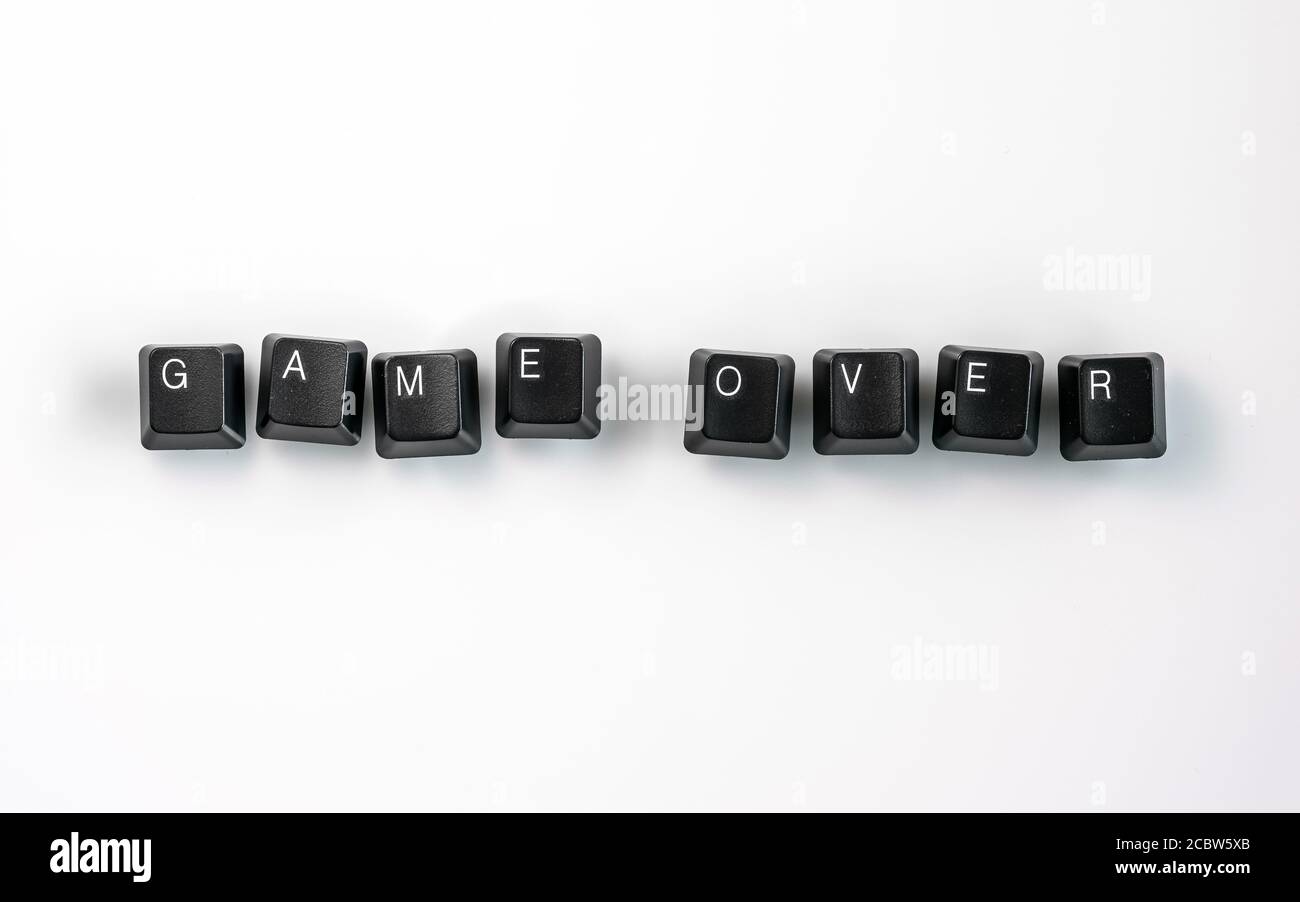 Computer keyboard keys spelling Game Over, isolated on white background Stock Photo
