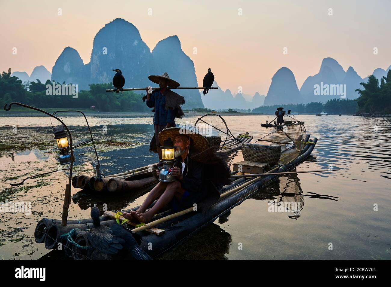 China, Guangxi province, Guilin, cormorant fisherman on Li river around Yangshuo Stock Photo