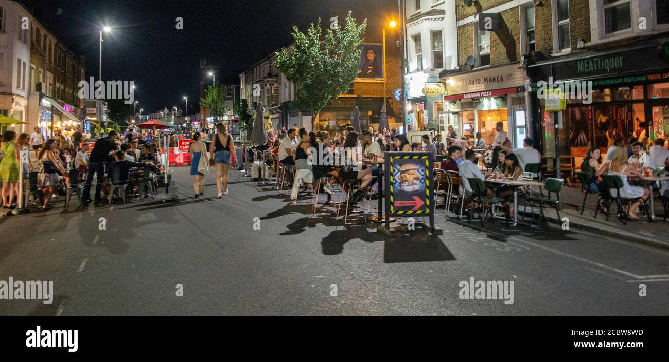 August 2020:with lockdown laws relaxed, Northcote Road in Clapham is pedestrianised to allow restaurants and bars to put tables in the road for diners Stock Photo