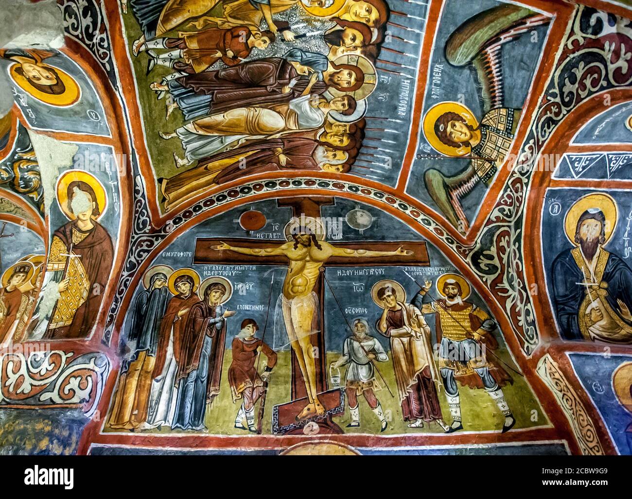 A beautiful fresco showing the Crucifixion of Christ at the Karanlik Kilise (Dark Church) at the Open Air Museum at Goreme in Cappadocia in Turkey. Stock Photo