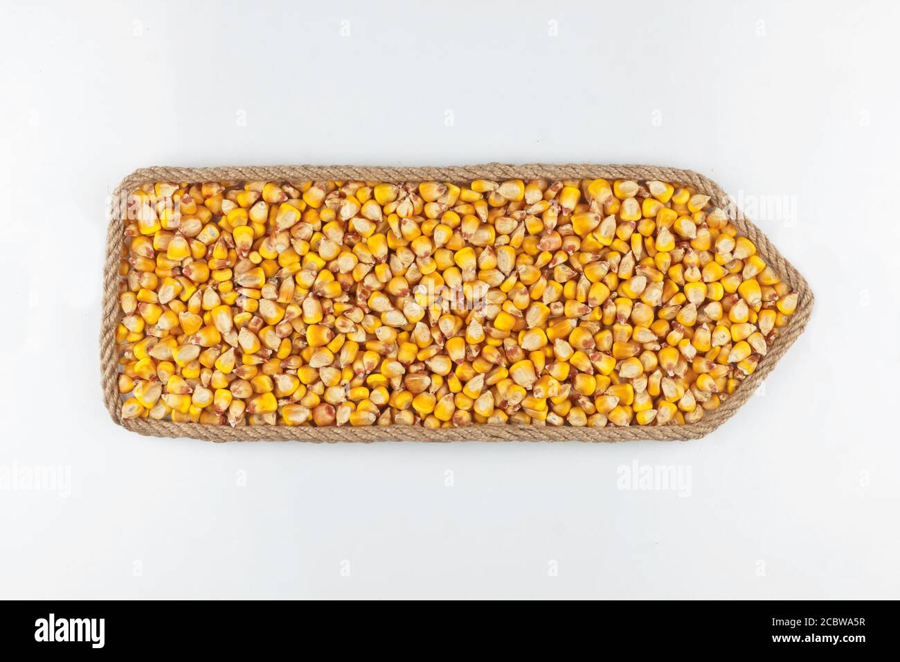 Pointer made of rope, filled with a grain of corn. Isolated on white ...