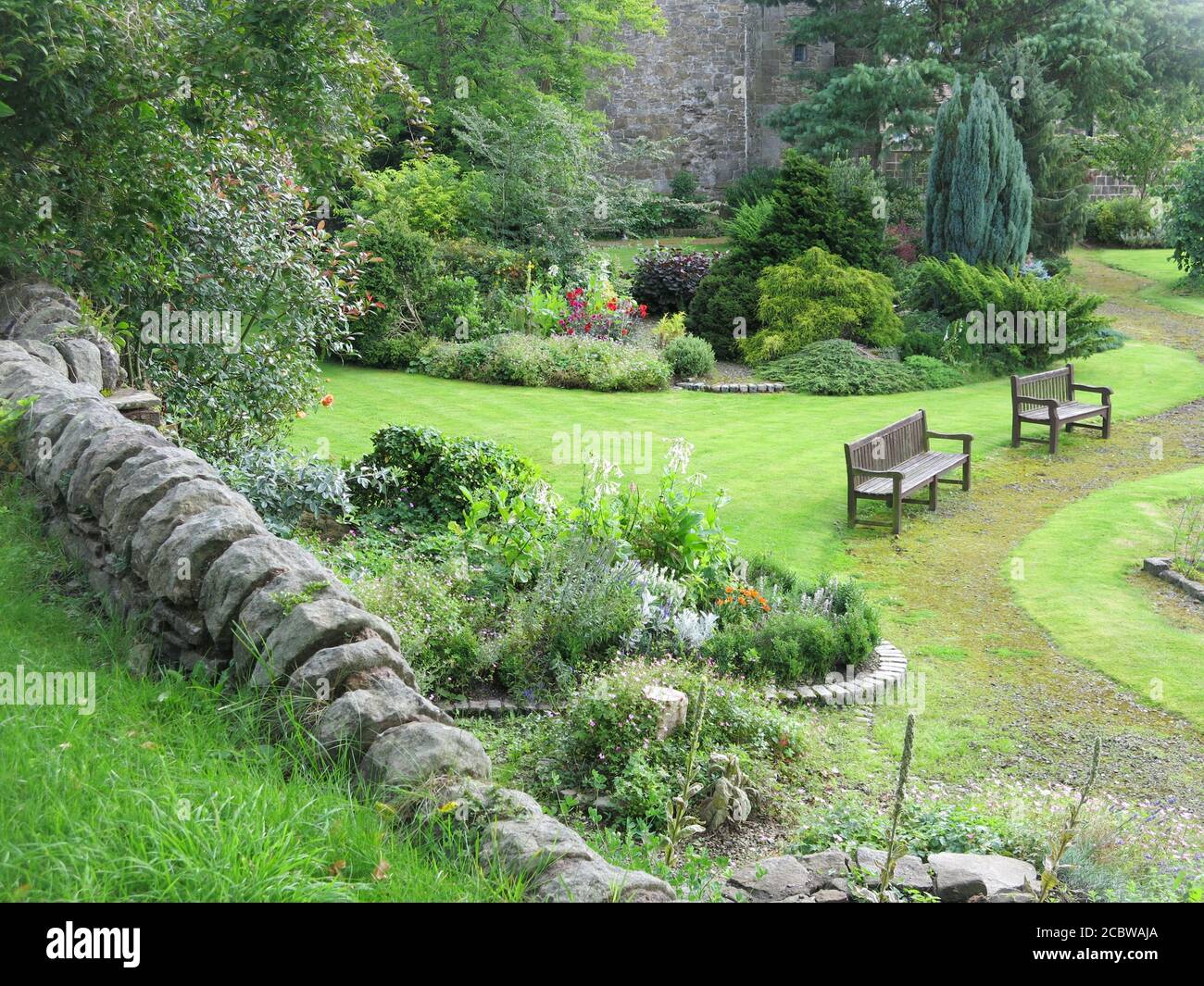 The grounds of Whalley Abbey with the remaining footprint and foundations of the 14th century Cistercian monastery; Clitheroe in the Ribble Valley. Stock Photo
