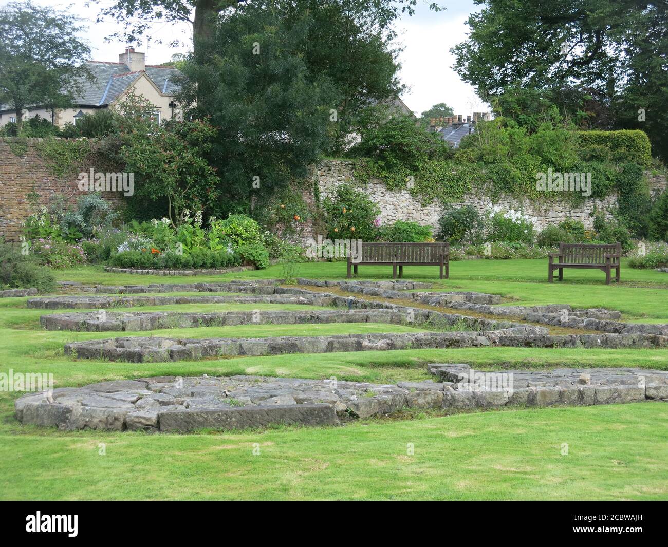 The grounds of Whalley Abbey with the remaining footprint and foundations of the 14th century Cistercian monastery; Clitheroe in the Ribble Valley. Stock Photo