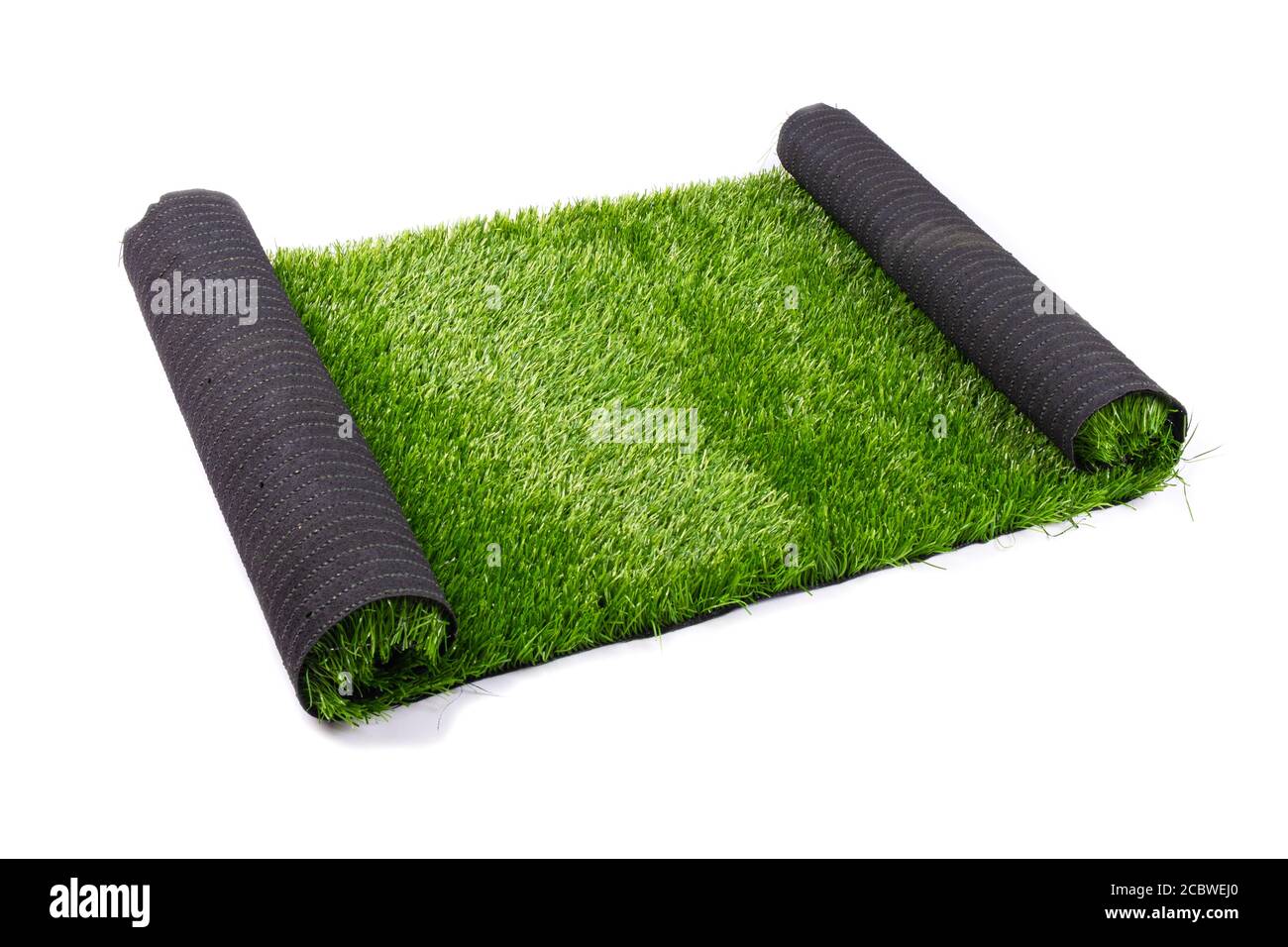 artificial green grass, lawn isolate on white background close up. Stock Photo