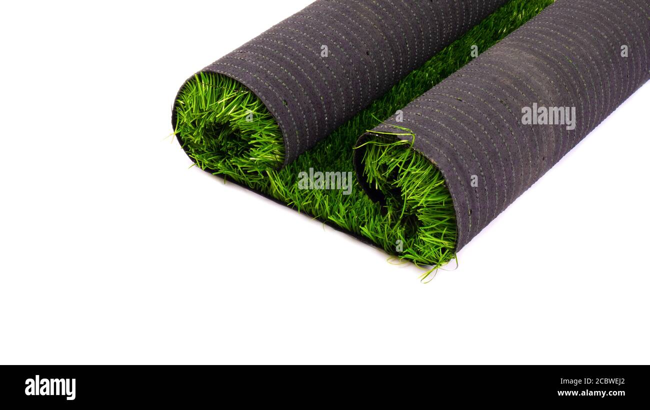 artificial green grass, lawn isolate on white background. Stock Photo