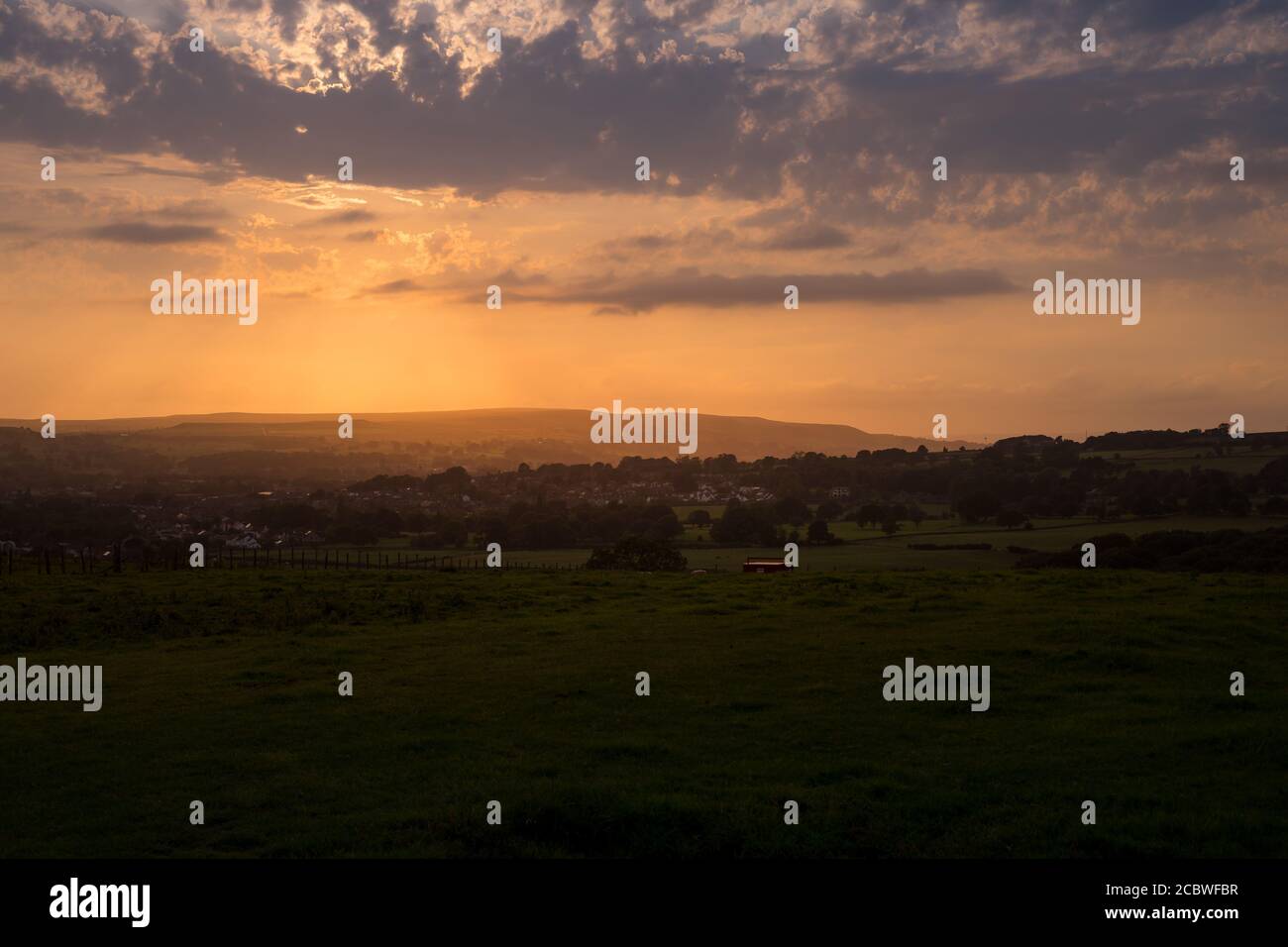 Sunset over countryside Stock Photo