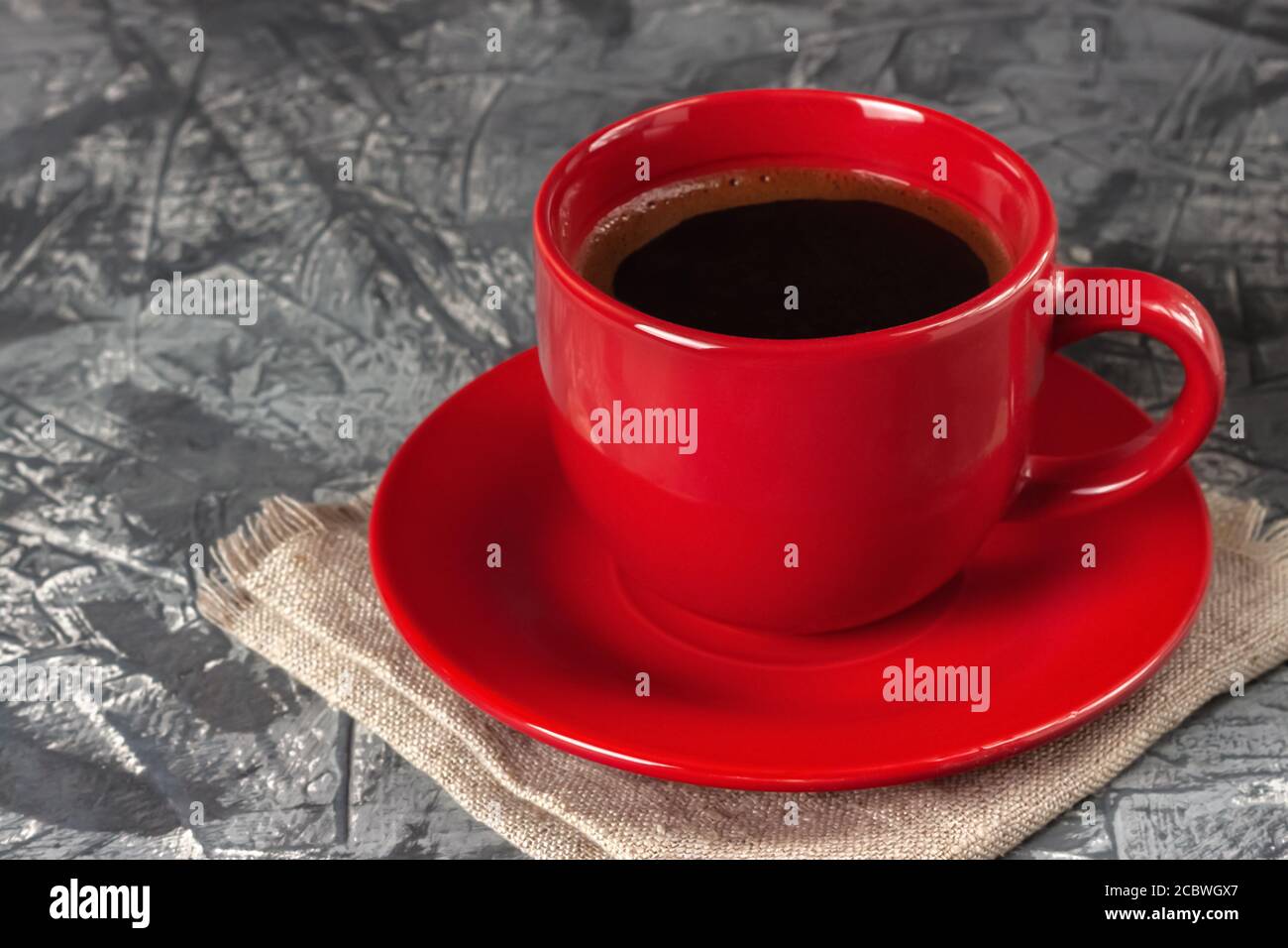 Cup of black aromatic freshly brewed coffee on gray background Stock ...
