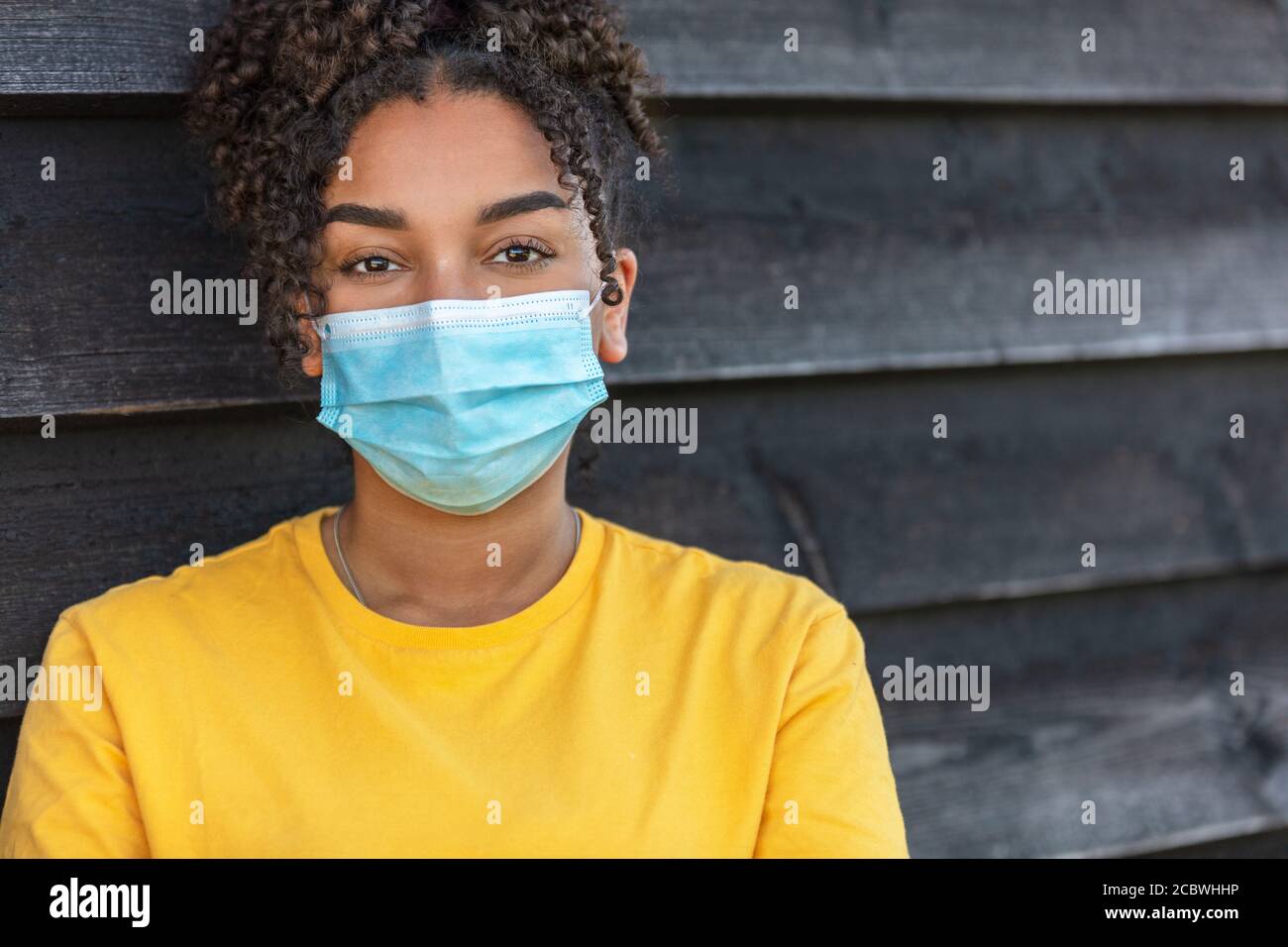 Black female surgical mask hi-res stock photography and images - Alamy