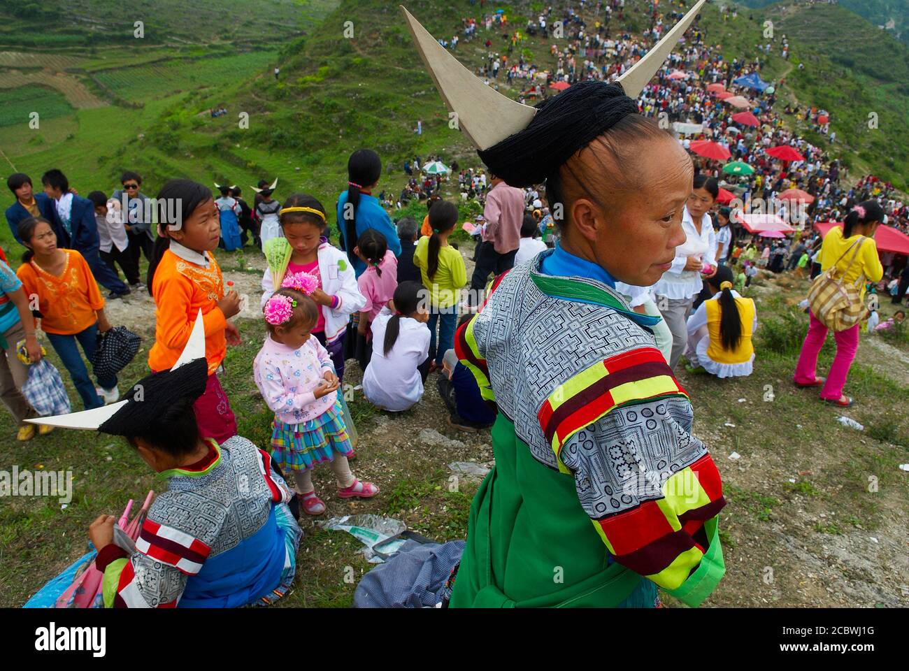 China. Guizhou province. Around Zhijian. Long Horn Miao girls in ...