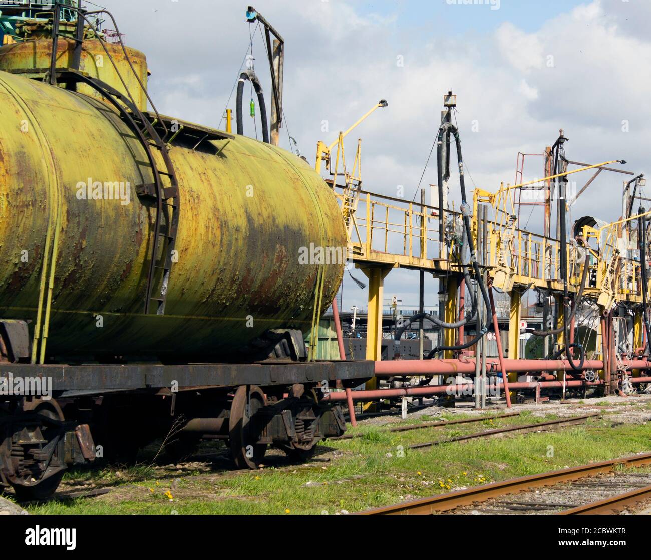 old railroad tank. The filling complex. Illegal extraction of oil Stock Photo