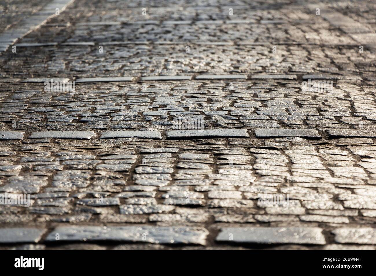 Abstract background of old cobblestone pavement close-up Stock Photo ...